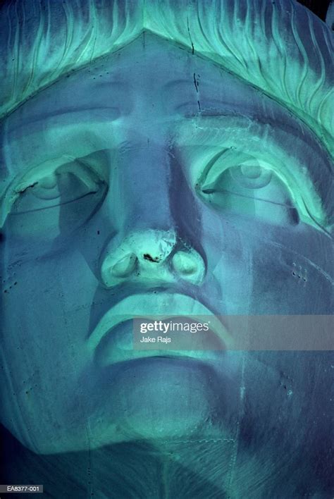 Usa New York City Face Of Statue Of Liberty Illuminated At Night High