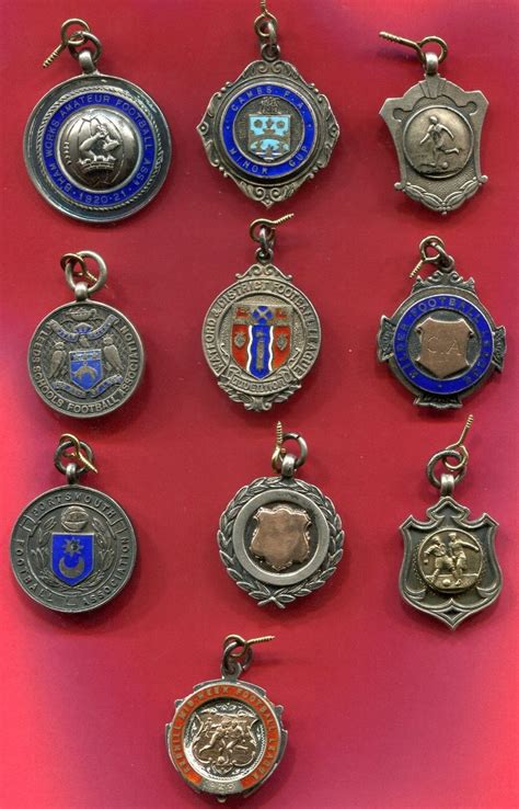 Football Medals A Collection Of Ten Silver Medals To Include 19201921