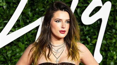 Bella Thorne Wears Black Lingerie And Fur Coat In Snow Pics Hollywood Life