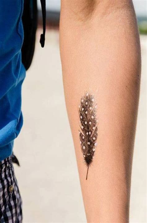 Maybe you would like to learn more about one of these? black feather tattoo on arm | Feather tattoo design, Feather tattoos, Dot tattoos