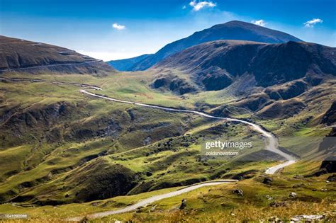 Mountain Landscape With Winding Road High Res Stock Photo Getty Images