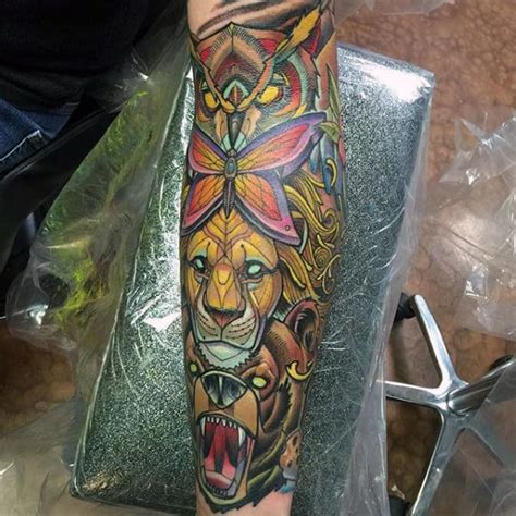 In most cases you will find that people want their tiki tattoos to look as authentic as possible, but in other cases they will. 70 Totem Pole Tattoo Designs For Men - Carved Creation Ink