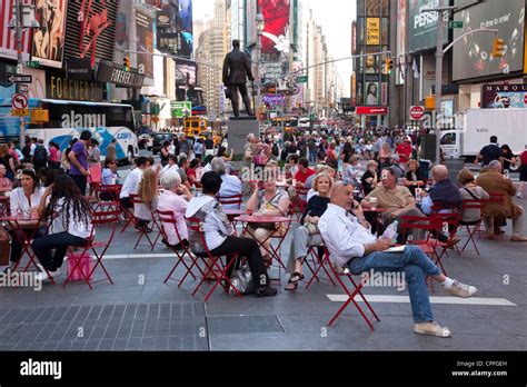 Crowd Of People Enjoying Times Square In New York Stock Photo Alamy