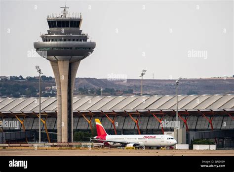 An Iberia Airplane In Seen On The Runway At Adolfo Suarez Madrid