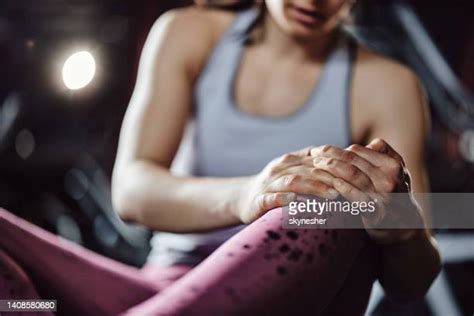 Woman Gym Pain Photos And Premium High Res Pictures Getty Images