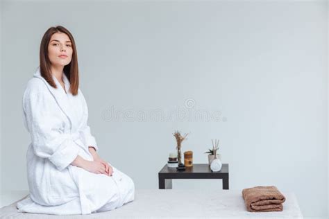 Sensual Young Woman In Bathrobe Sitting In Spa Salon Stock Image