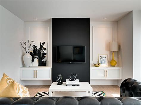 Taught definition, simple past tense and past participle of teach. How To Hide Tv Black Accent Wall | TheNest.com | Black ...