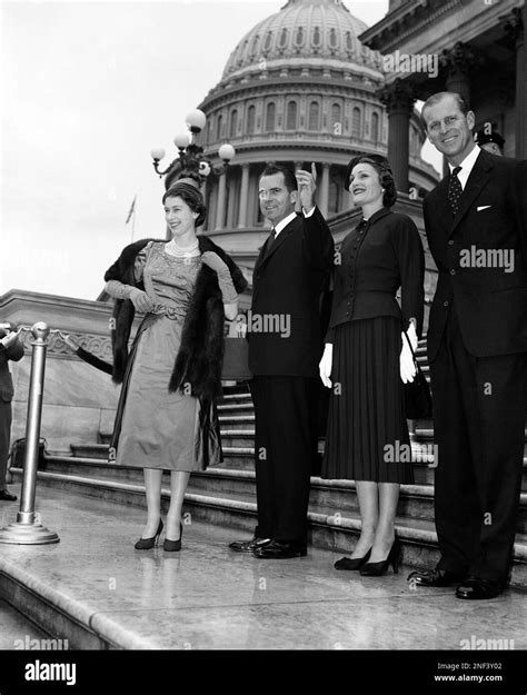 Queen Elizabeth Ii And Her Husband Prince Philip Pose On The Capitol