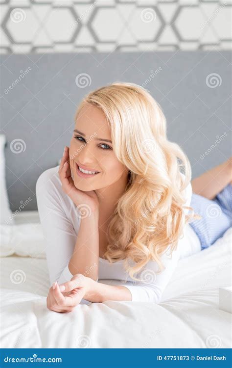 Pretty Blond Woman Lying In Prone On Bed Stock Image Image Of Lovely Resting 47751873