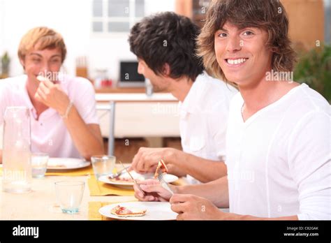 Guys Eating Bacon Stock Photo Alamy