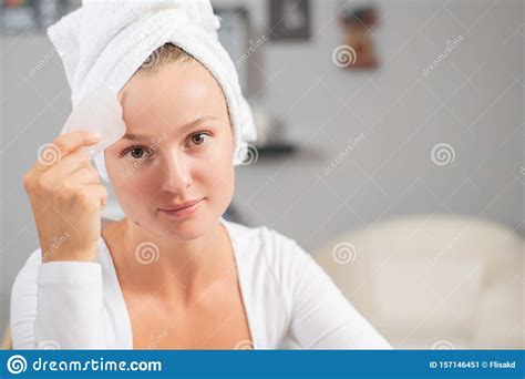 Face Massage Beautiful Woman Is Getting Massage Face Using Jade Stone For Skin Care Stock Image