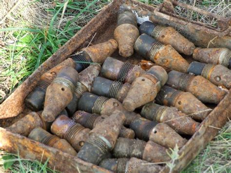 An unexploded bomb from World War II found in the ground — Stock Photo © photovova #13846808