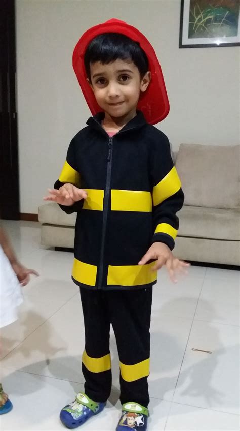 All i did was, bought a roll of yellow cloth tape or duck tape and got started. Quick DIY Fireman Costume | Fireman costume, Diy fireman costumes, Firefighter costume kids