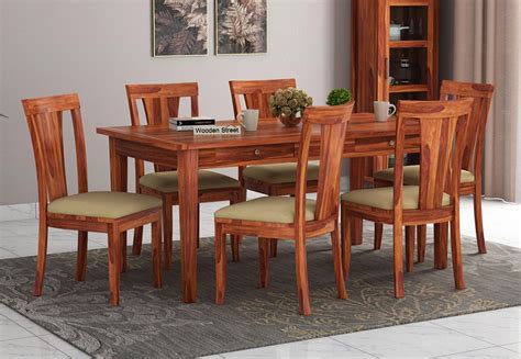 Explore designer dining table set of 4, 6, 8 seater only at the house of things. Buy Mcbeth Storage 6 Seater Dining Table Set (Honey Finish ...