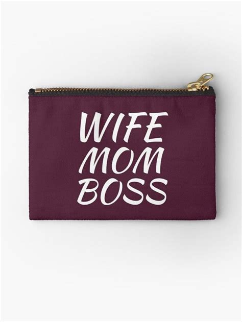 A Maroon Zipper Pouch With The Words Wife And Boss Printed On It In White Ink