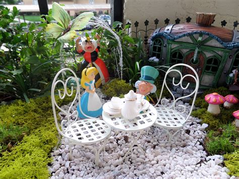Alice In Wonderland Garden On My Patio Fairy Garden Ideas Enchanted