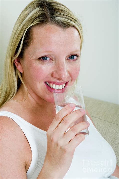 Pregnant Woman Drinking Milk Photograph By Paul Whitehill Science Photo