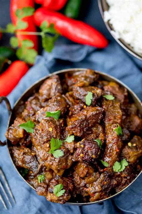 With slow cooker beef stew, you can use a longer, lower cooking temperature and leave the beef to tenderize while you work (or go sledding!). Beef Rendang - Slow-cooked fall apart spicy beef with a touch of heat. (With images) | Indian ...