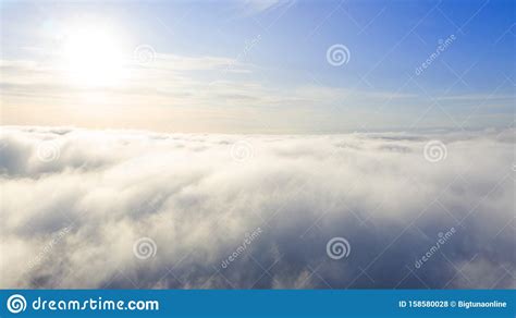 Aerial View White Clouds In Blue Sky. Top View. View From Drone. Aerial Bird`s Eye View. Aerial 