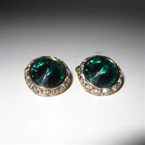 Vintage Unsigned Clip On Earrings With A Large Emerald Green Rhinestone