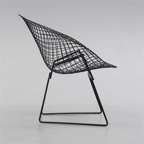 The diamond chair was first displayed in 1952 and actually in production by 1953. A Harry Bertoia 'Diamond Chair', second half of the 20th ...