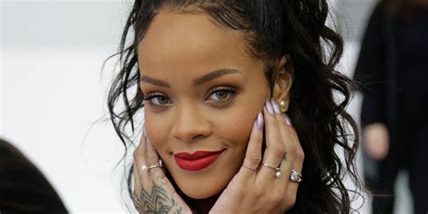 Rihanna Gets Pretty In Pink For Christian Dior Cruise 2015 Show