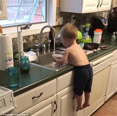 How do you bathe a baby in the sink? Toddler dangles over sink and washes bowls on Instagram ...