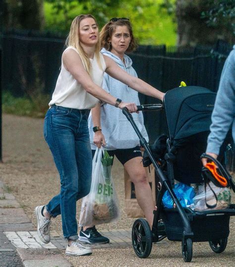 Amber Heard Takes Daughter For Walk Amid Johnny Depp Drama