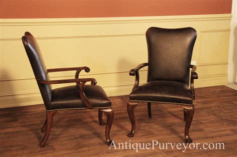 Armchairs feature generously upholstered arms. Leather Upholstered Dining Room Arm Chairs with Queen Anne ...