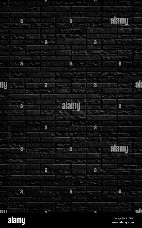 Abstract Black Brick Wall Texture Background Vertical View Of Masonry