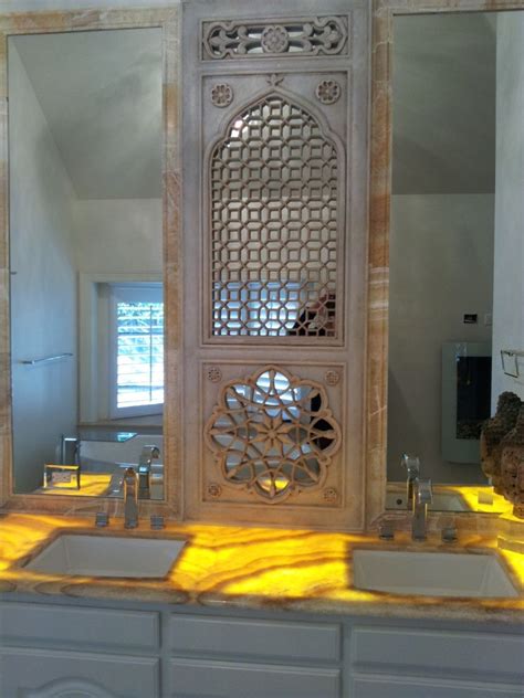 This jali designed mandir has hanging diya's that are much needed to give your pooja room a mandir look at home. Urban Homestead created a peaceful bathroom using a marble jali panel from AOI Home | Paneling ...