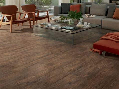 What is the best treatment for wood floors? Our Flooring: Solid Wood vs. Faux Wood Tile - Chris Loves ...