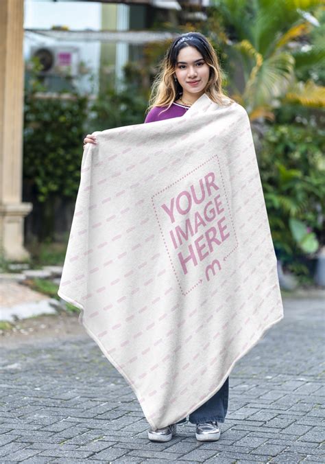 Mockup Of A Blanket Featuring A Woman Outside Mediamodifier