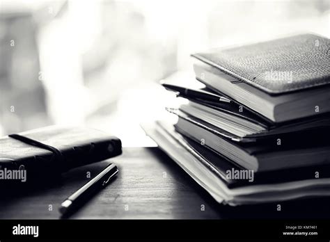A Stack Of Textbooks On A Table Stock Photo Alamy