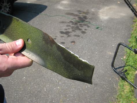 How To Sharpen A Lawn Mower Blade Using A Grinder Example Craftsman