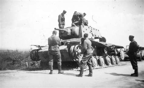 German Soldiers Examining Destroyed Kv 1 Tank With Extra Armor World