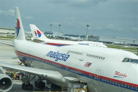 malaysia airlines flight lands early after possible fire