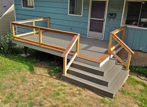Front porch built with wrap around stairs. Designed and Built by