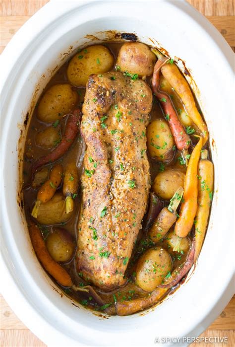 Place the marinated pork on top of the strings and rosemary. Crock Pot Pork Loin with Vegetables (VIDEO) - A Spicy ...