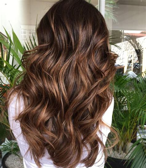 The combination of lowlighted and highlighted hair in the dark brown hair, these are all you need to get the ravishing look. Dark brown hair styles with highlights and lowlights