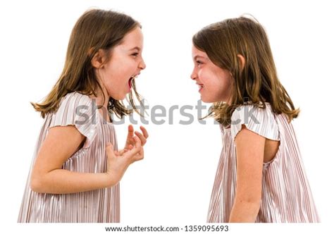 Identical Twin Girls Looking Each Other Stock Photo 1359095693