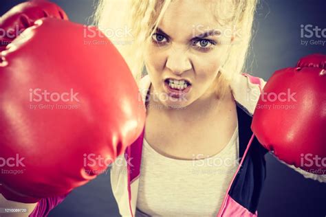 Angry Woman Wearing Boxing Gloves Stock Photo Download Image Now