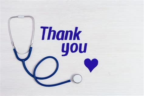 Premium Photo Medical Stethoscope Blue Heart And Text Thank You On