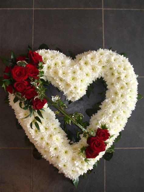 The stands are created by local florists with seasonal flowers displayed on a stand. Open Heart in 2020 | Funeral floral arrangements, Floral arrangements diy, Funeral flower ...