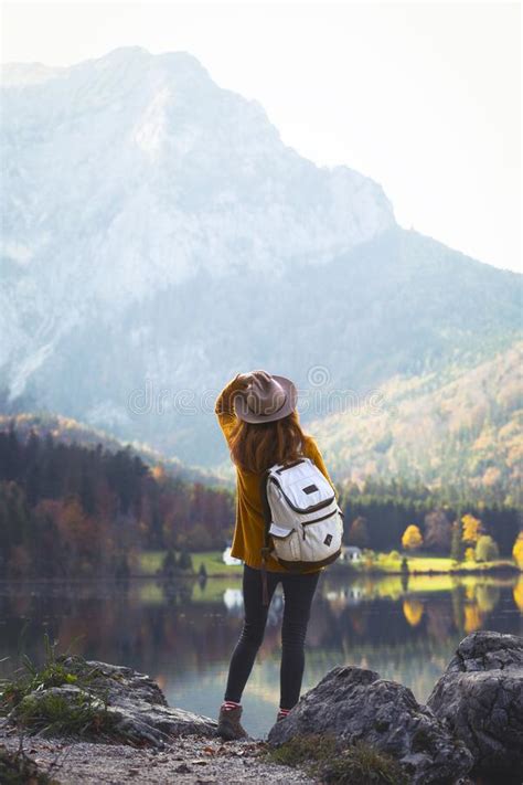 Girl Stands On The Shore Of A Mountain Lake Stock Photo Image Of