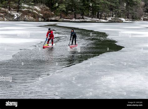 People Paddle Boarding Stock Photo Alamy