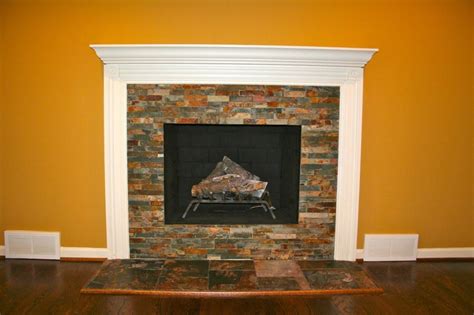 Despite its simplicity, wood stove surround like in the picture will succeed in bringing warmth to the room. Decoration Build Country Stacked Dry Stone Fireplace Surround Ideas - Cute Homes | #65336