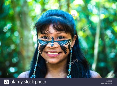 Native Brazilian Girl Smiling At An Indigenous Tribe In The Amazon