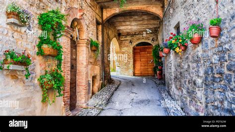 Old Streets Of Italian Village View With Floral Decorationspello