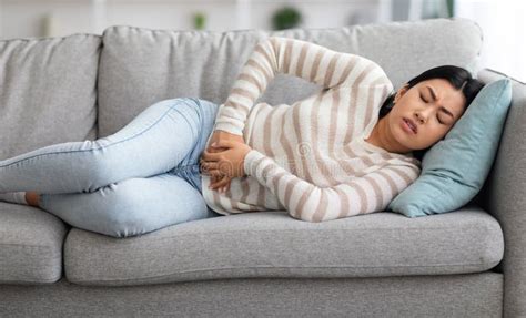 Period Pain Young Asian Woman Suffering From Acute Stomach Ache At